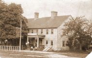 Ketcham Inn c.1900 with bicycle rack in front.  The dirt road at the edge of the photo was known then as the King’s Highway