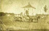 Historic photo of our home with members of the Golding family.