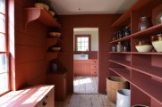 Looking into the kitchen from the restored pantry.