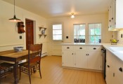 Our client's oak table and crank phone fit right in with the new period kitchen